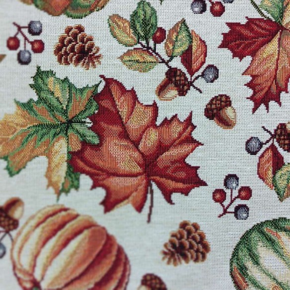 AUTUM jacquard fabric with autumn leaves and pumpkins design. Width 140 cm.