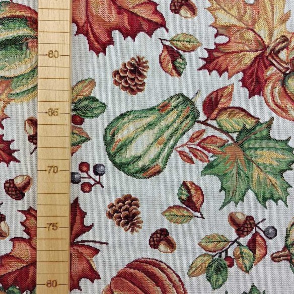 AUTUM jacquard fabric with autumn leaves and pumpkins design. Width 140 cm.