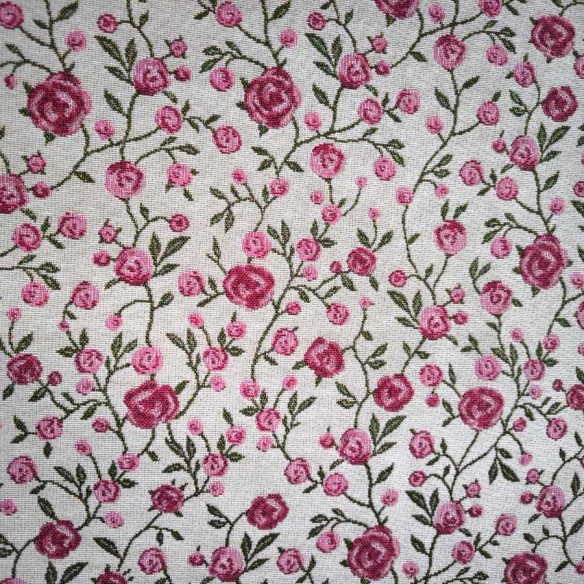 WINS jacquard fabric with pink flowers and green leaves. Width: 140 cm
