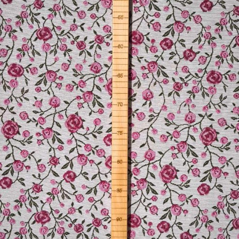 WINS jacquard fabric with pink flowers and green leaves. Width: 140 cm