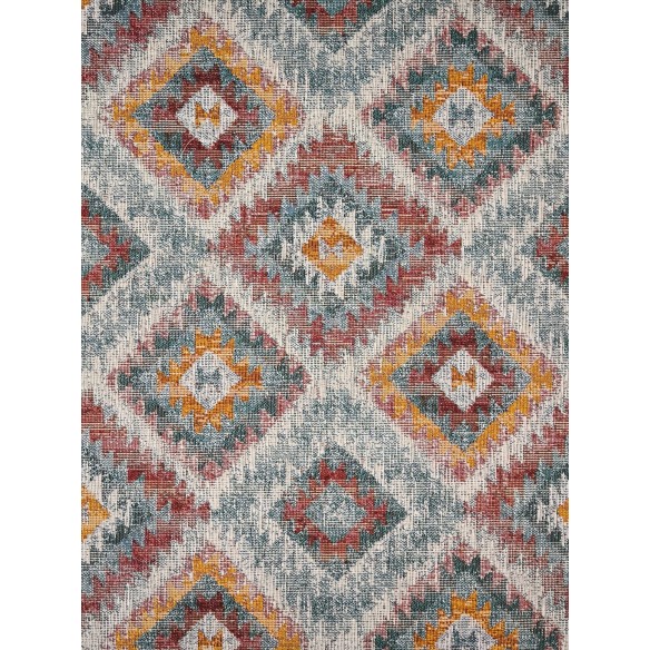 Tejido Jacquard LOSANGO Ikat con motivos geometricos rojos verdes y amarillos. Ancho 140