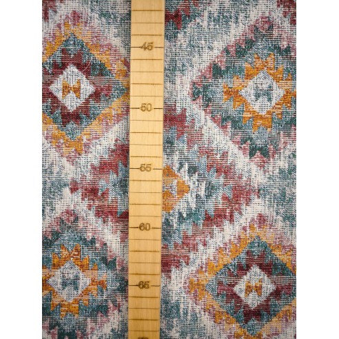 Jacquard LOSANGO Ikat fabric with geometric motifs in red, green and yellow. Width 140 cm.