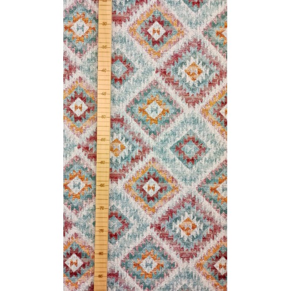 Tejido Jacquard LOSANGO Ikat con motivos geometricos rojos verdes y amarillos. Ancho 140